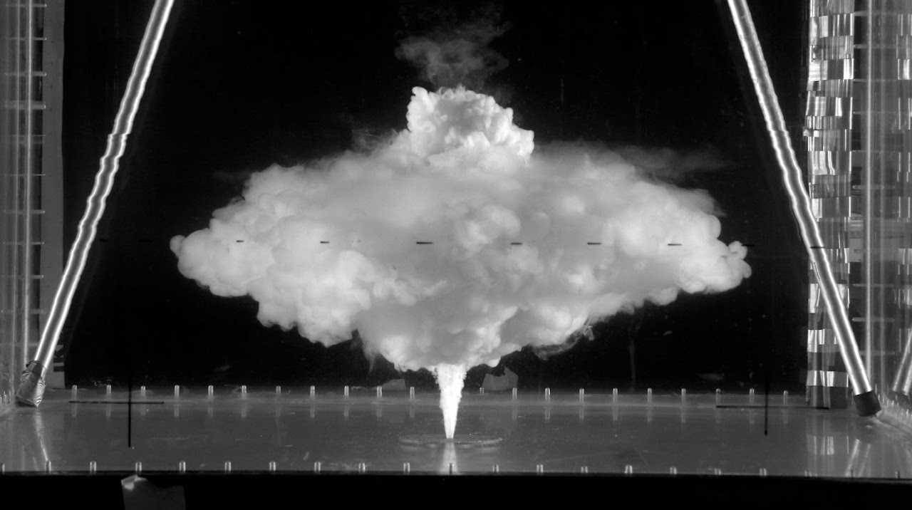 Analog experiment on particle-water jet